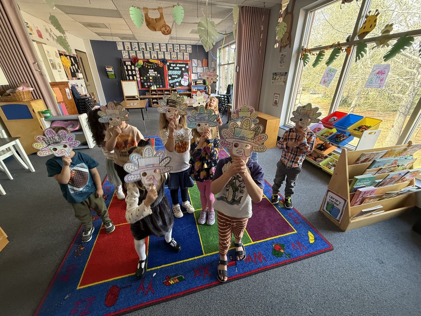 Kids holding craft projects